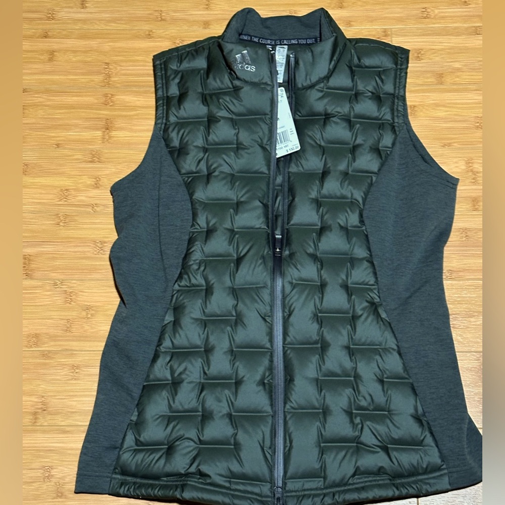 Adidas women’s padded vest (M)